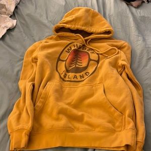 Golden-yellow “whidbey island” hoodie.